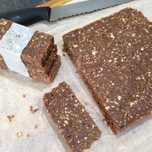 Peanut butter energy bars block, half cut into bars