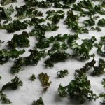 Kale chips on a baking sheet