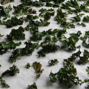 Kale chips on a baking sheet