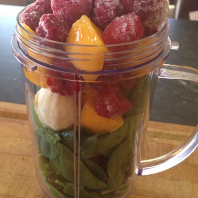 green smoothie ingredients in a blender cup 5