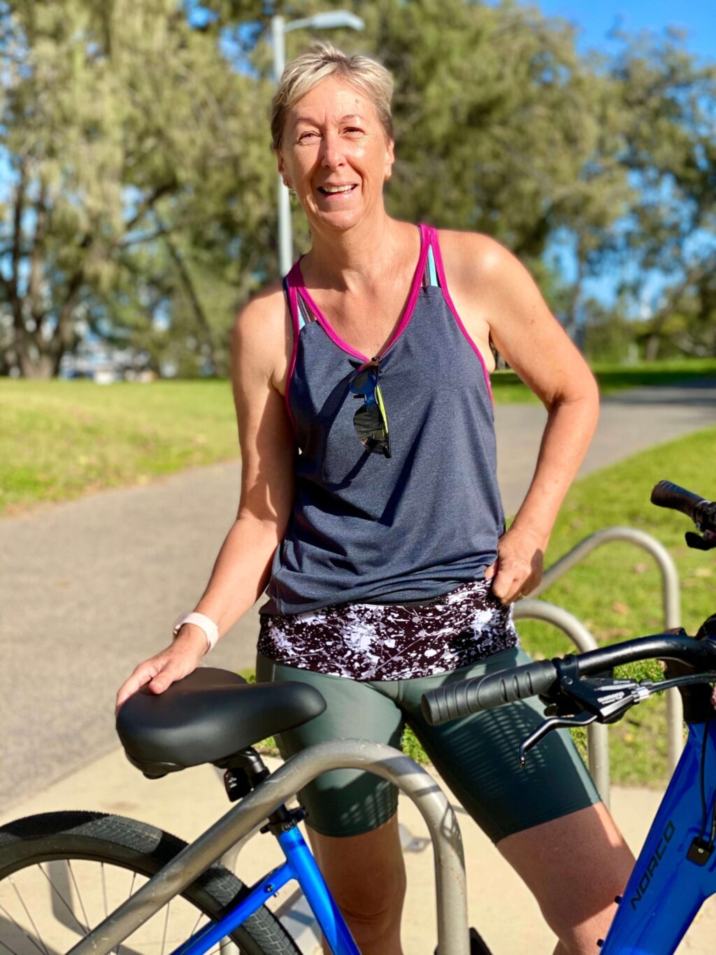 Wendy posing next to her bike