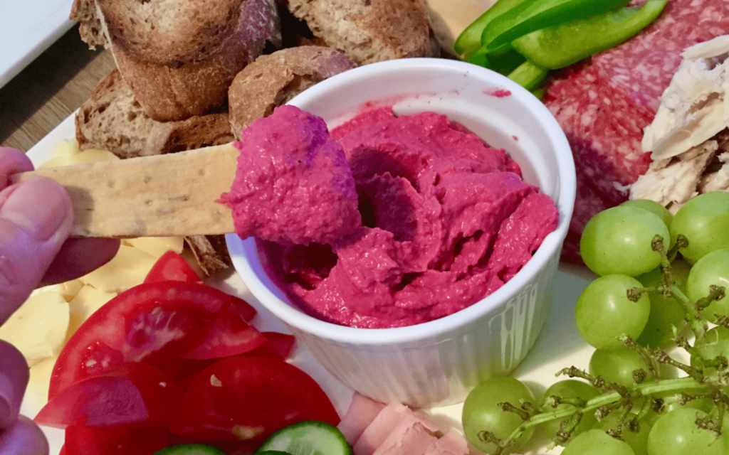 Beetroot dip on a sharing platter