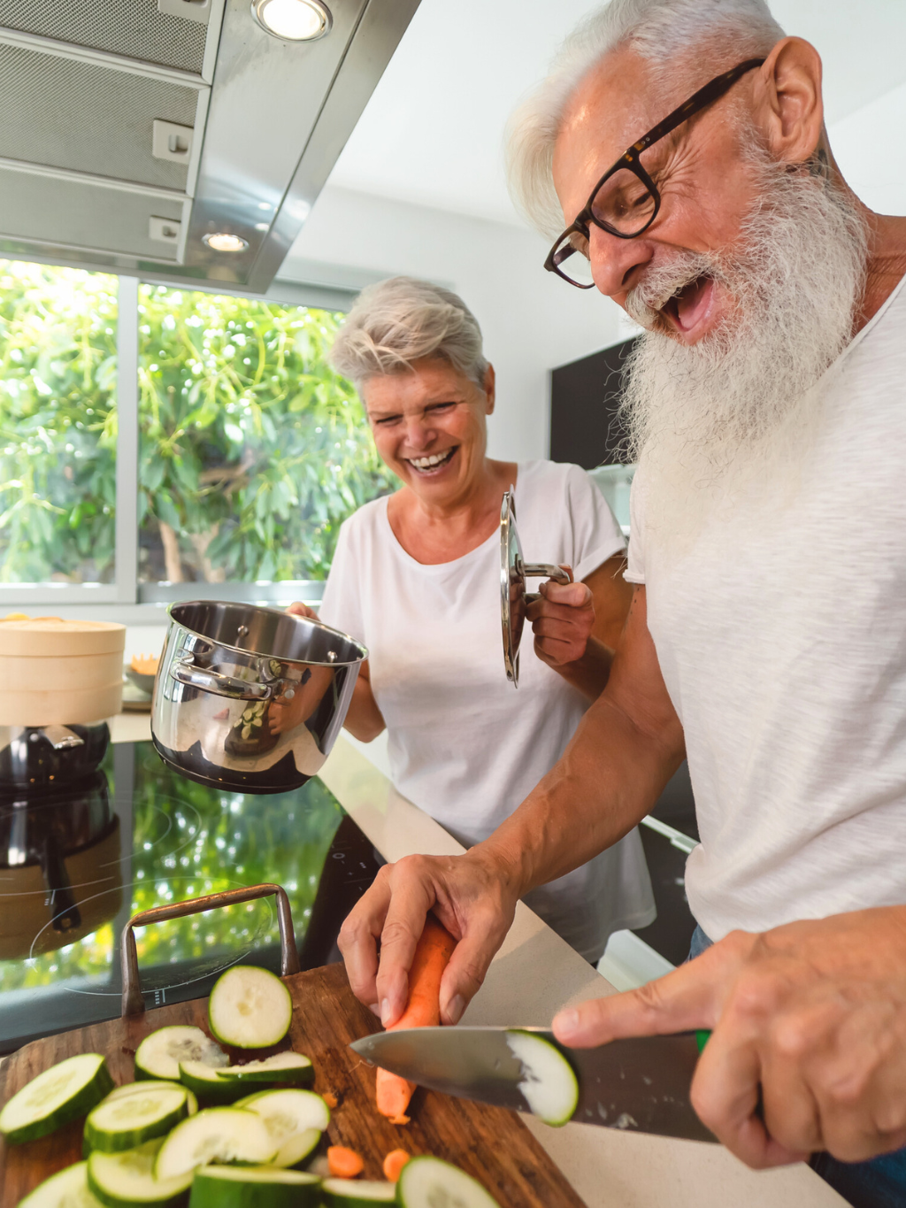 Couple having fun cooking in the kitchen