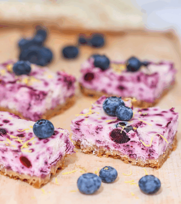 Blueberry cheesecake bites on a board