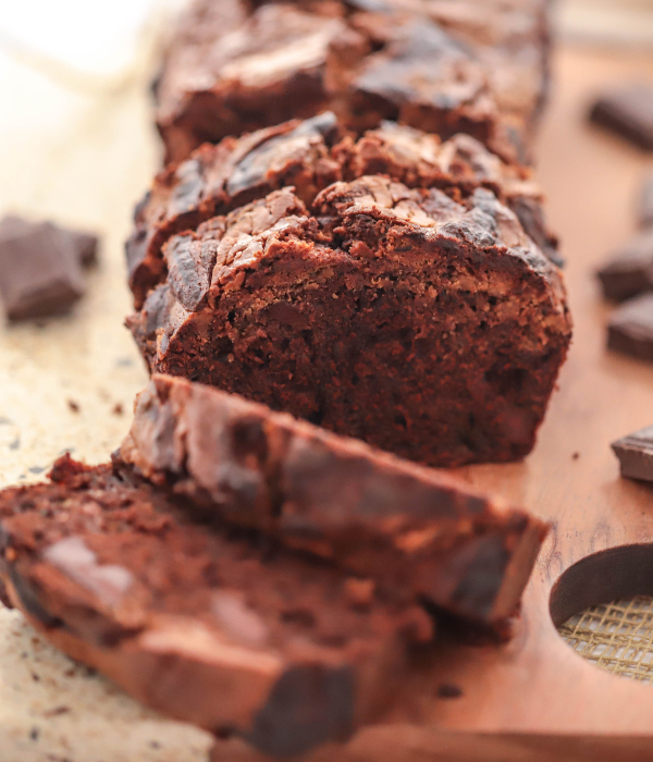 chocolate peanut butter zucchini bread, sliced on a board