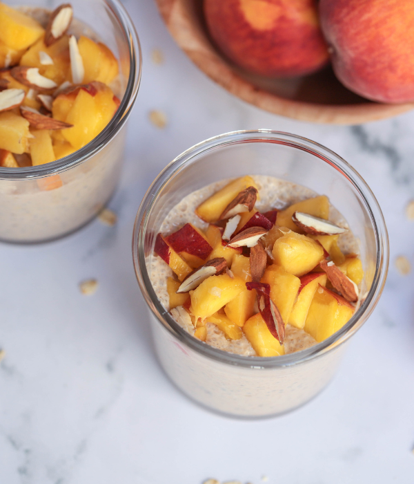 Peach and honey overnight oats served in pretty glass jars