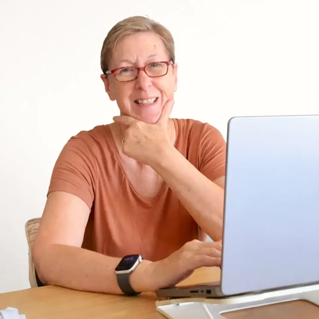Wendy working at her desk