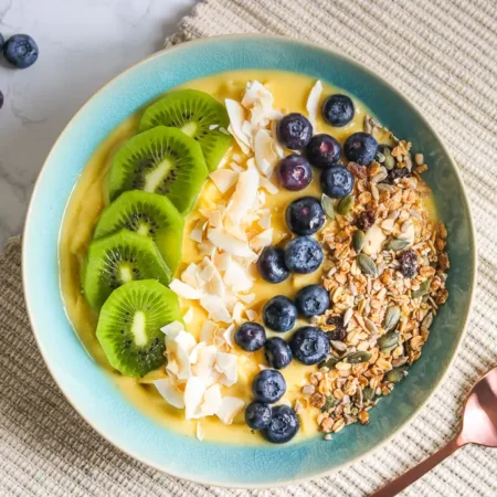 Tropical sunshine smoothie bowl, on a table