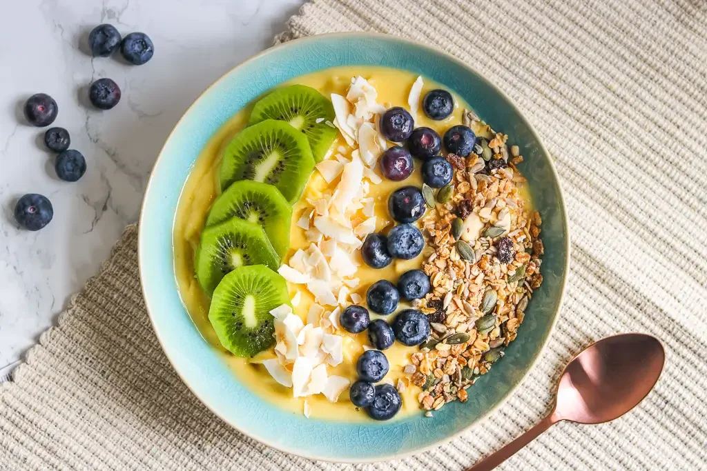 Tropical sunshine smoothie bowl, on a table